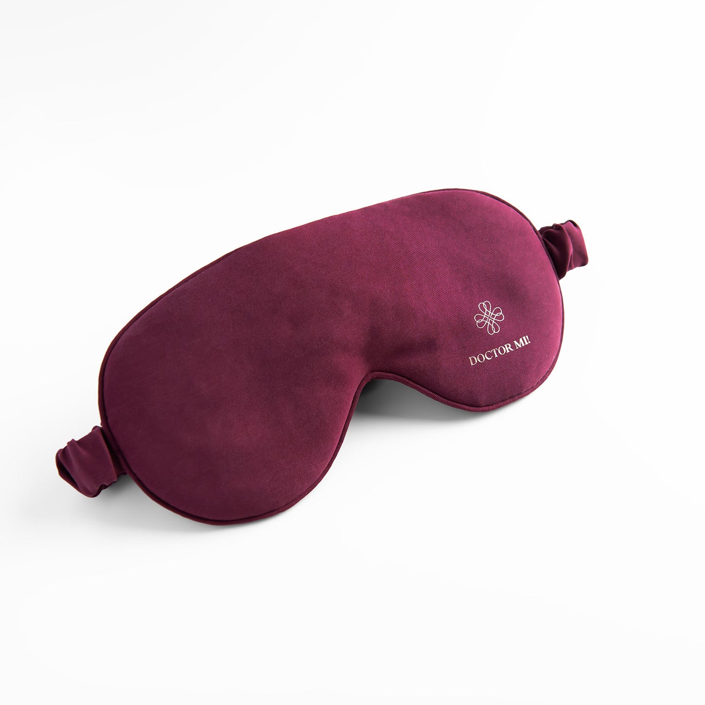 DOCTOR MI! SLEEP MASK hochwertige Schlafmaske für erholsame Nächte als praktischer Reisebegleiter in rotem Material auf weißem Hintergrund