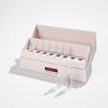 DOCTOR MI! SUPER LIFT AMPOULES tiefenwirksame Anti-Aging Lifting Ampullen, glättet feine Linien und Fältchen in weißer Verpackung mit Glasampullen auf grauem Hintergrund 